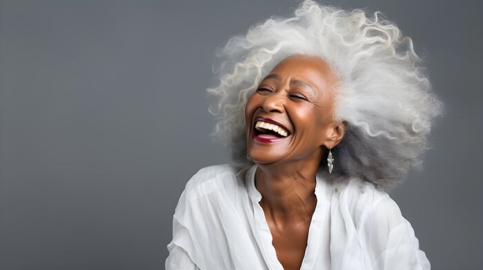 The Rounded White Afro, Full and Proud — thick hair haircut on a woman over 70
