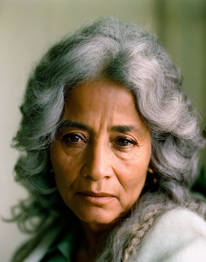 Long Thick Waves With Natural Gray Dimension — thick hair haircut on a woman over 70