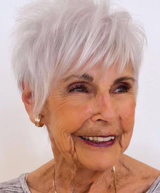 Woman over 70 with forward-directed crown layers on a pixie — haircut for very fine hair on a woman over 70 that hides scalp show-through