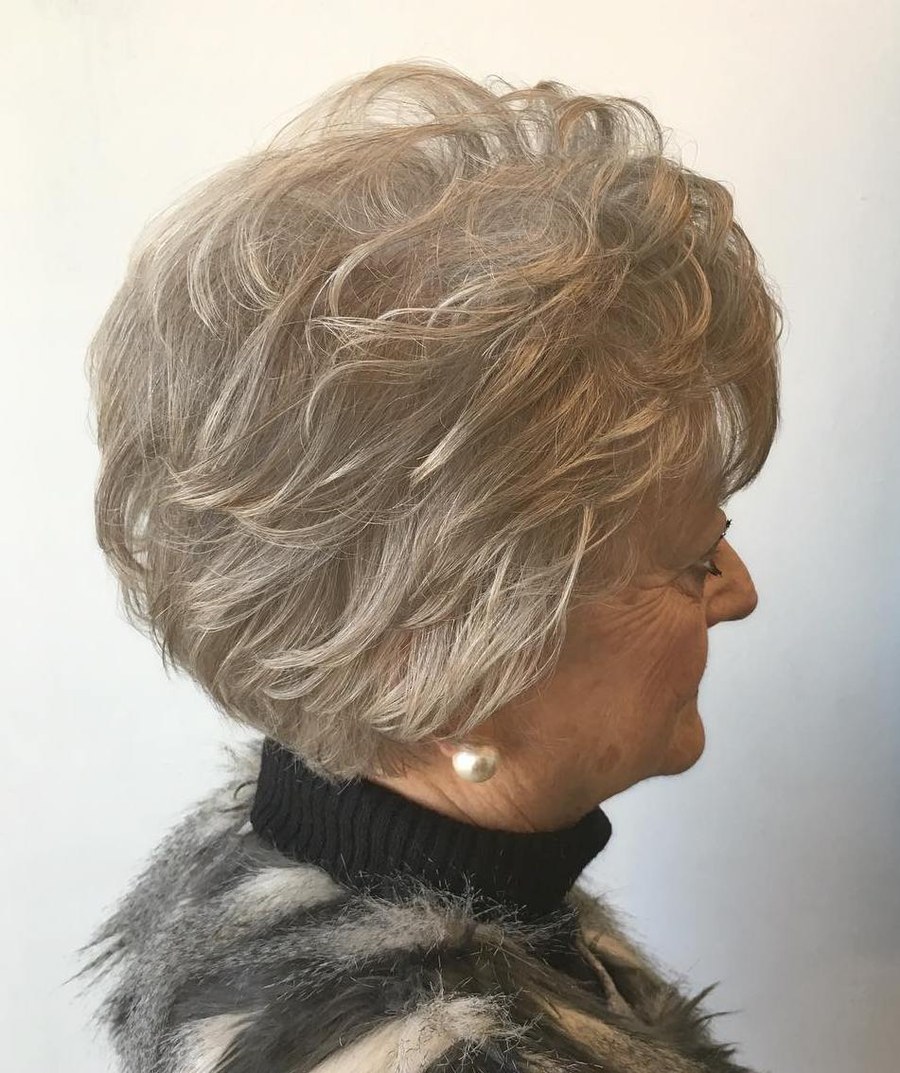 Woman over 70 with gentle back-brushed crown (soft lift, no teasing) — volumizing hairstyle for a woman over 70 with a thinning crown