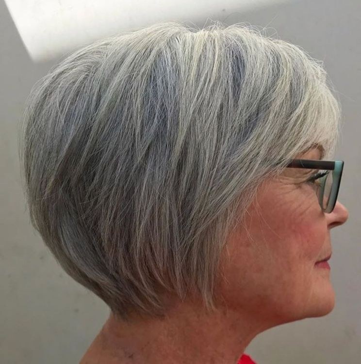 Woman over 70 with short bob with a crown undercut-lift (hidden support layer) — volumizing hairstyle for a woman over 70 with a thinning crown