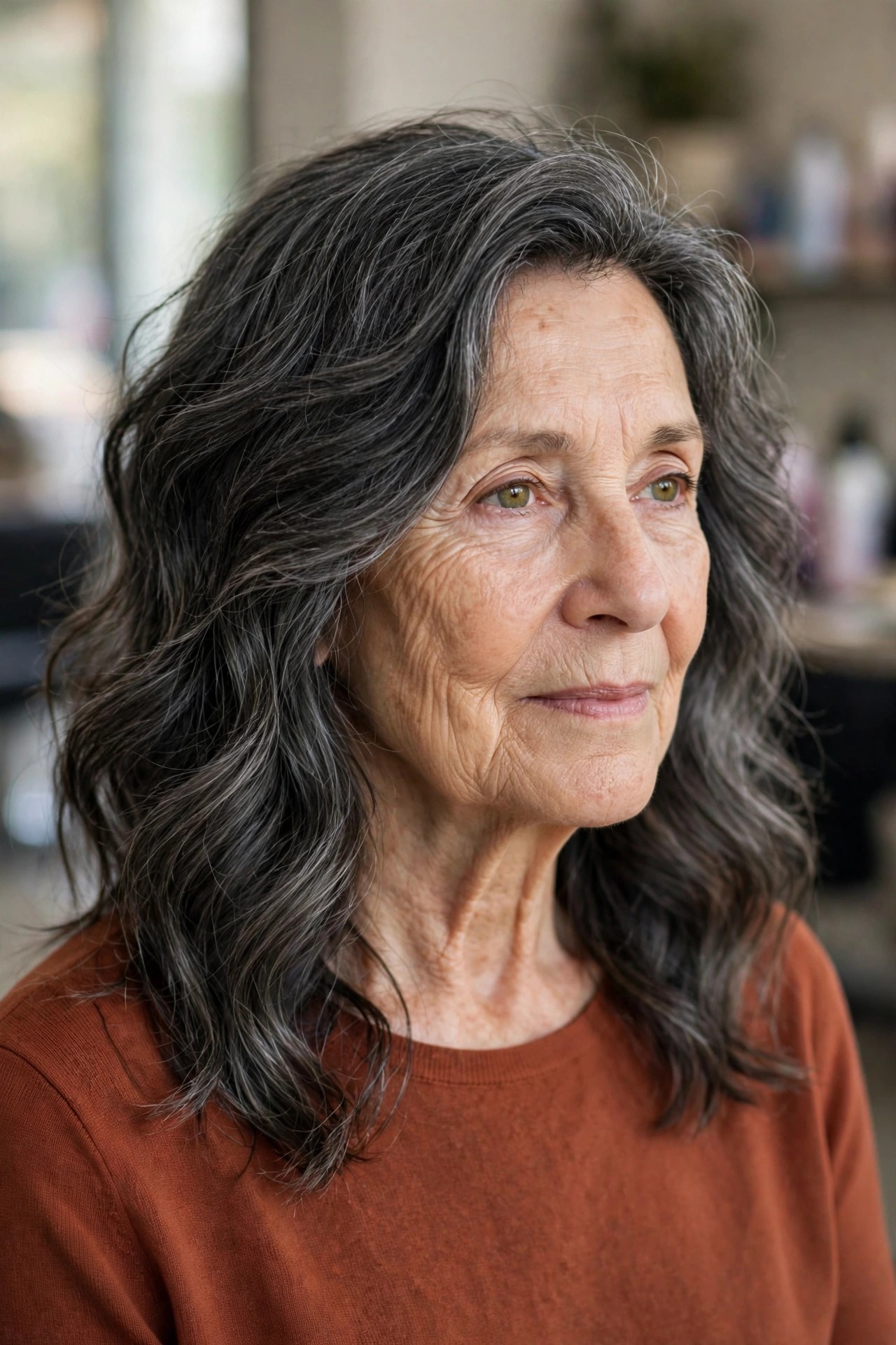 Tousled Loose Waves for Thick Dark-Gray Hair - wavy hairstyle for a woman over 60 with loose soft S-waves