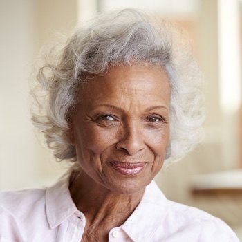 The Joyful White Natural Curls - white hair haircut on a woman over 70