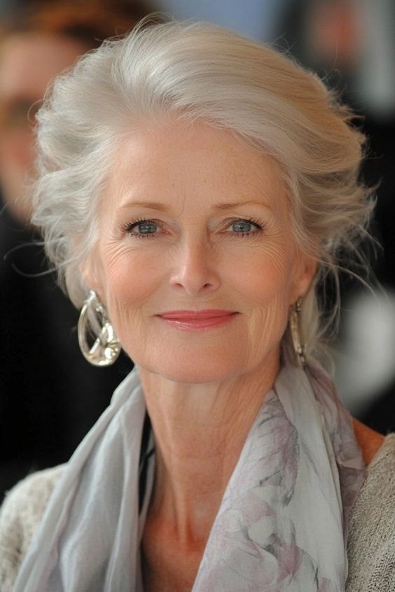 The Soft White Updo With Volume - white hair haircut on a woman over 70